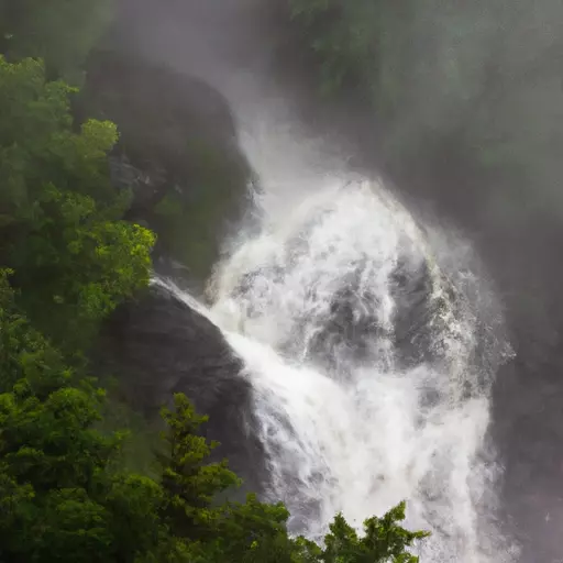 A picture of mist rising from a waterfall