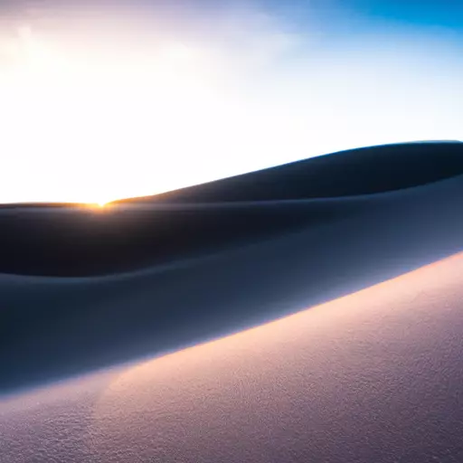 A picture of a sand dune at sunrise