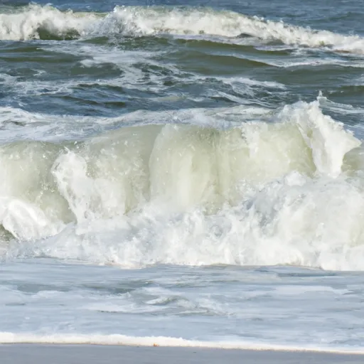 A picture of waves crashing on a beach