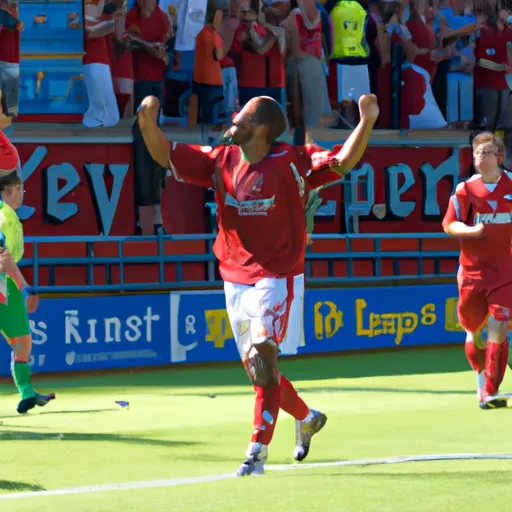 "Liverpool player celebrating after scoring a goal against Darmstadt in a pre-season match"