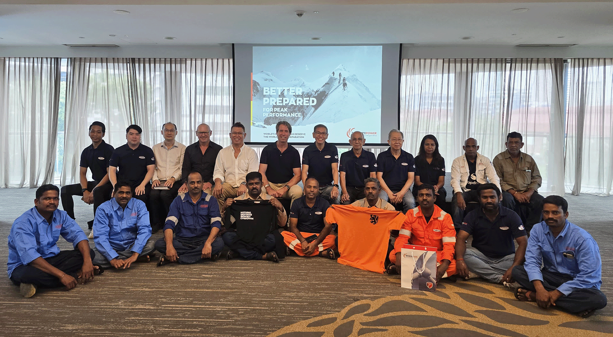 Flakecoat team members at a professional development meeting in Singapore