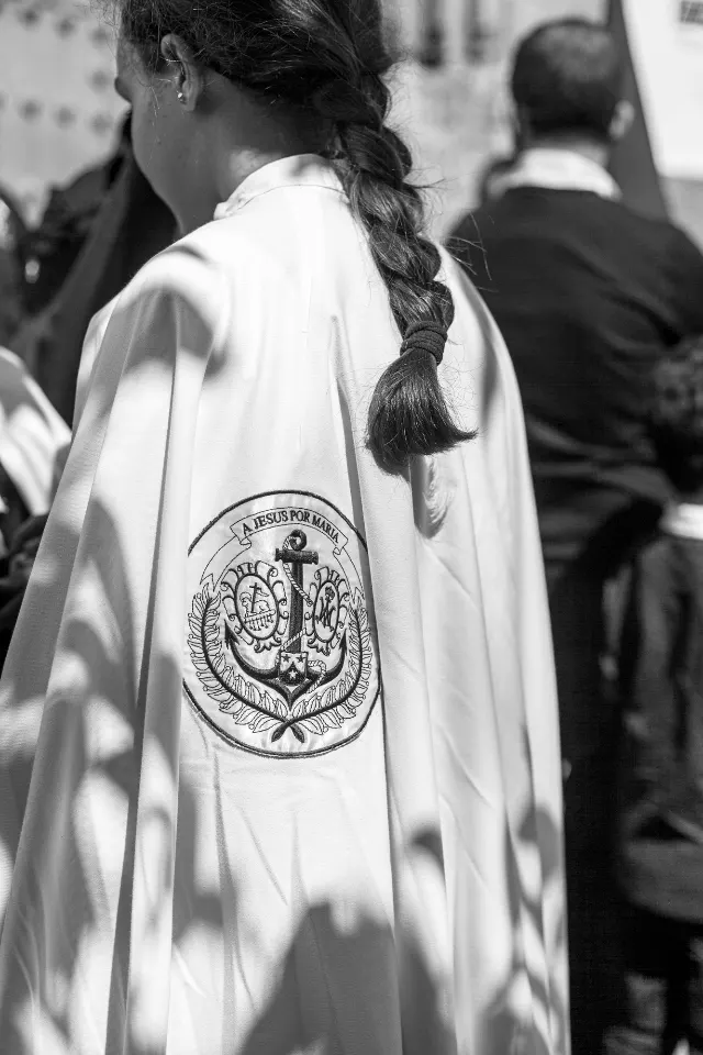 Semana Santa. Sevilla. Nazarenos y acólitos.
