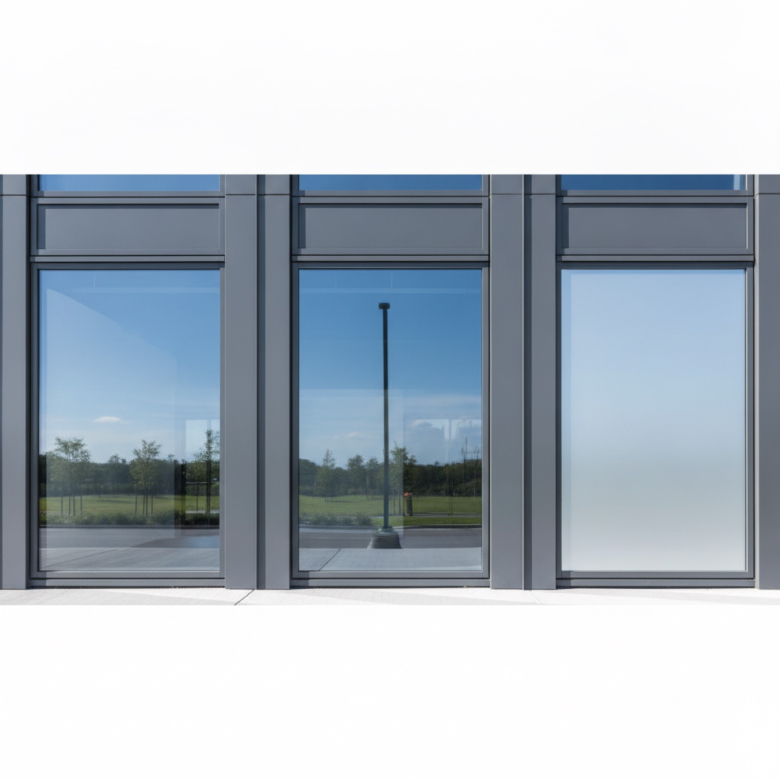 Three storefront systems shown adjacent on same facade for direct visual comparison