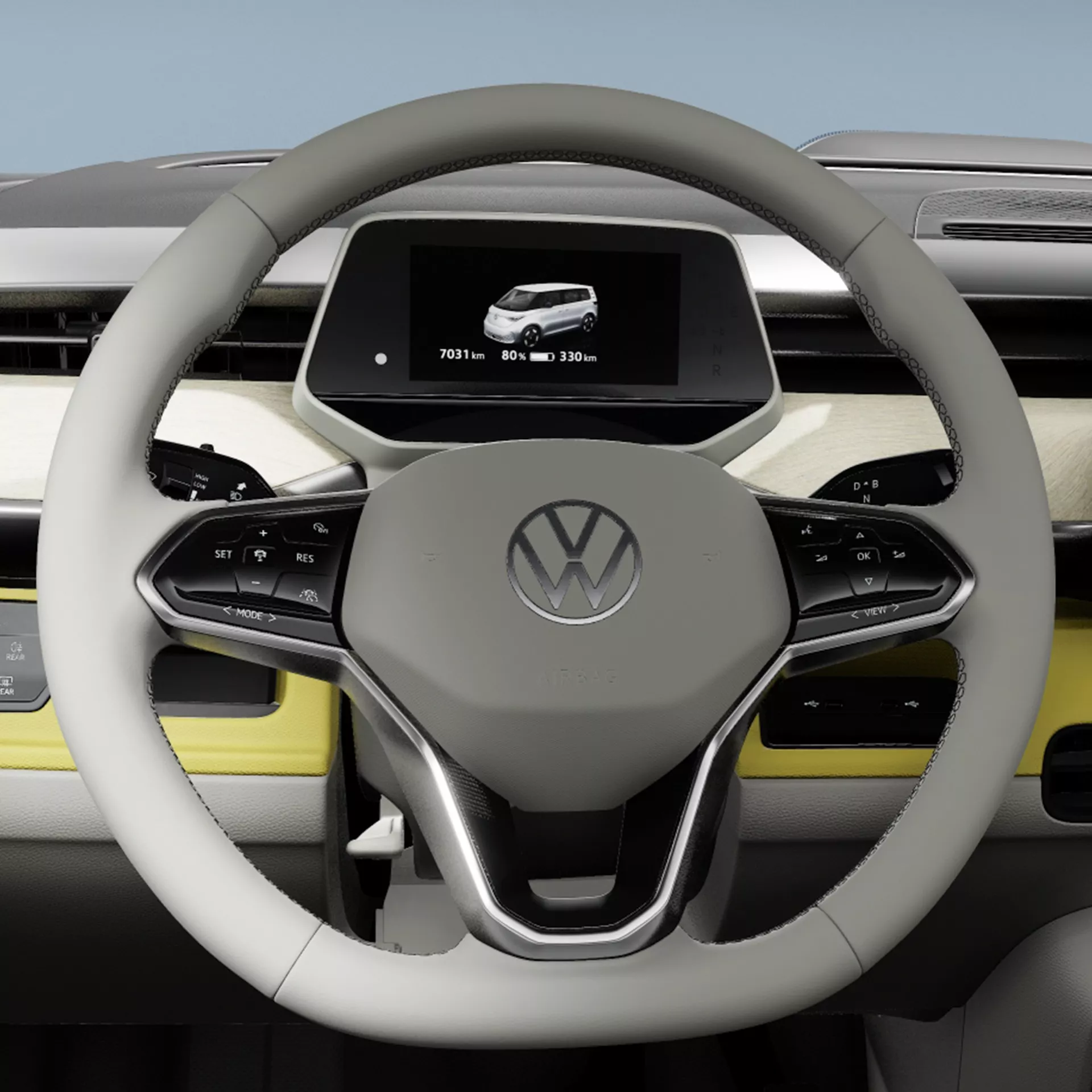 Il volante di un'auto elettrica Volkswagen ID. Buzz mostra un design moderno con un cruscotto digitale.