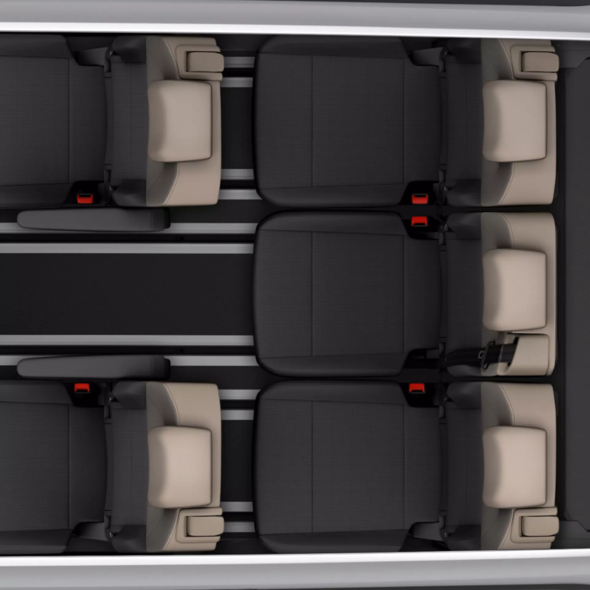 Vista dall'alto degli interni di un'auto con sedili neri e beige.