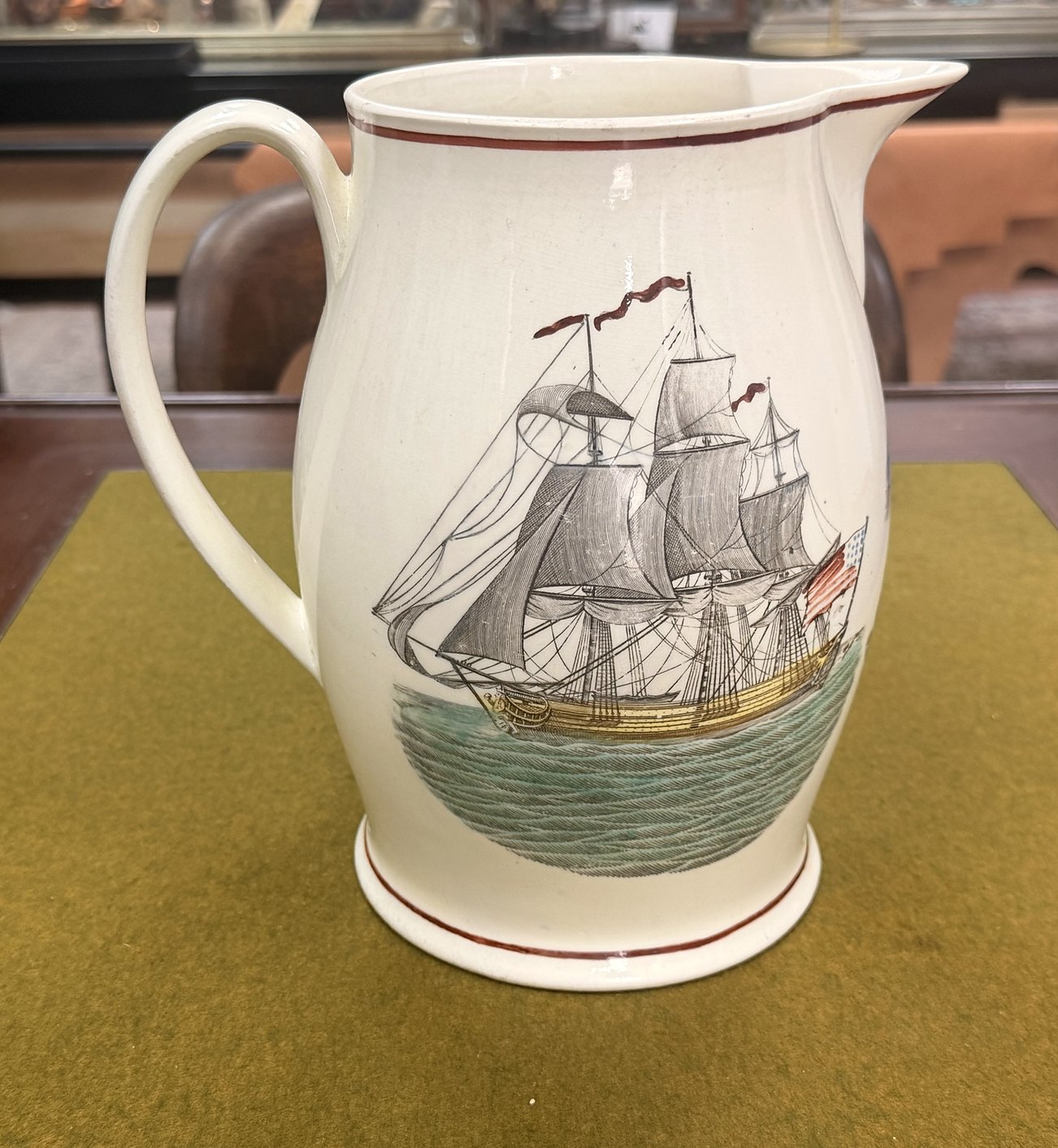 A Liverpool jug decorated with a sailing ship