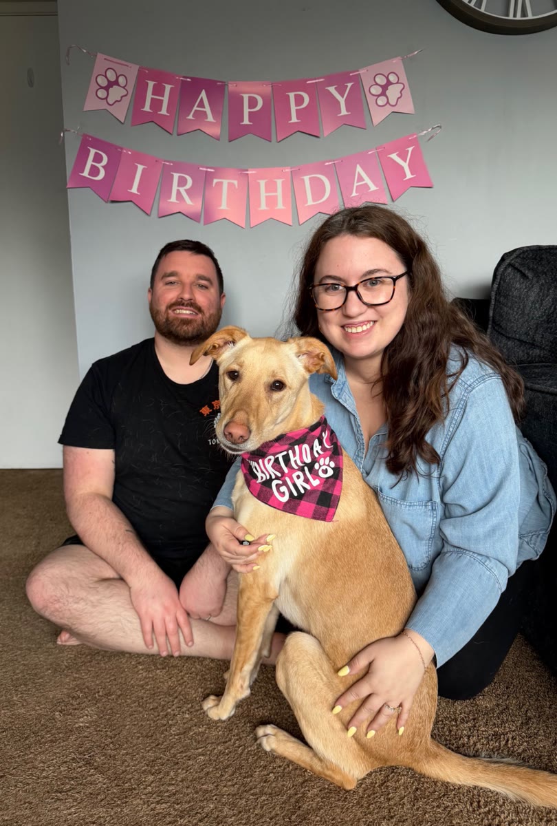 Rachel, her husband and their dog Daisy