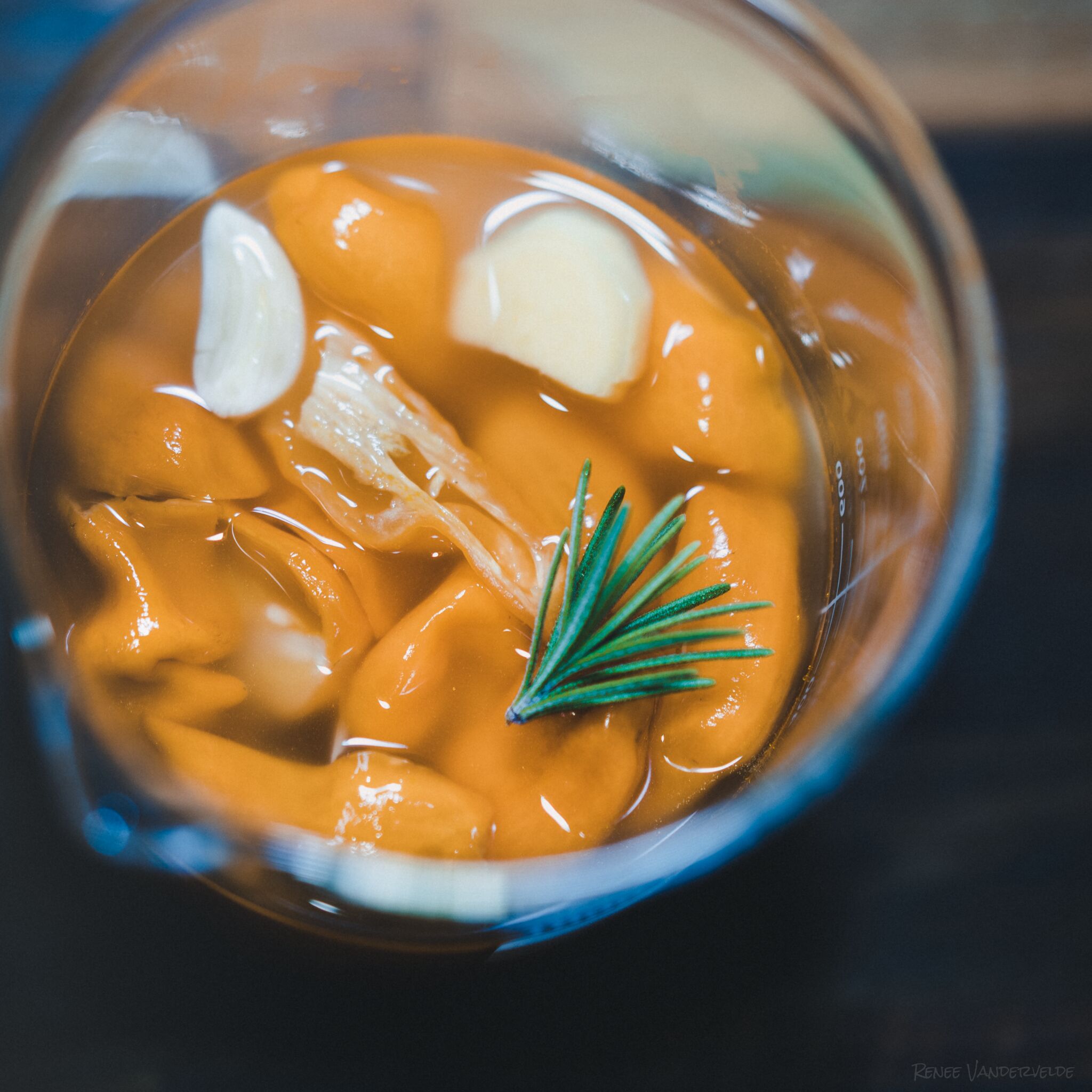 Peppers and garlic in a glass jar