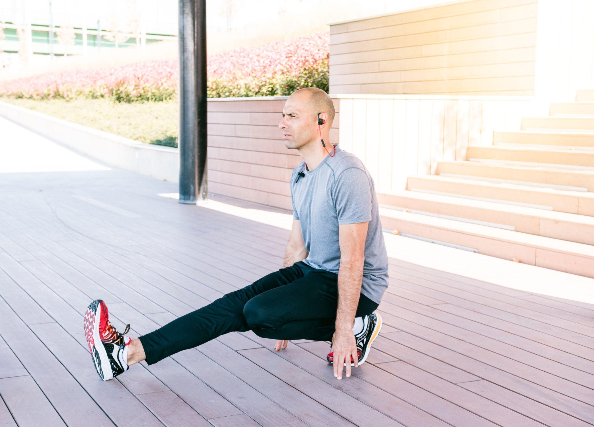 A man doing Hamstrings curls.