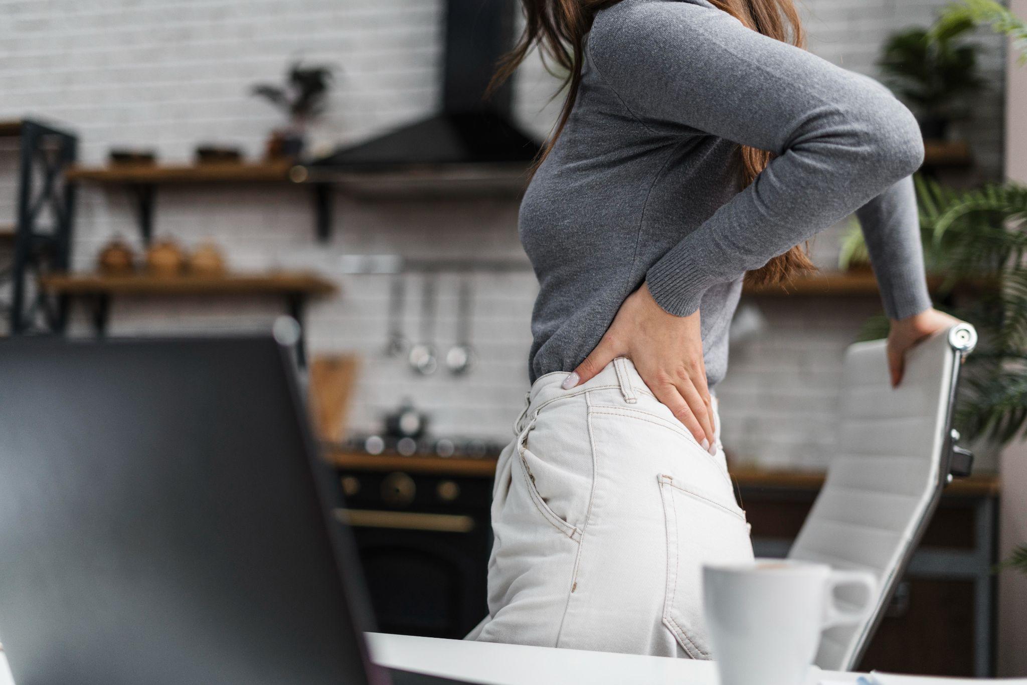 A woman with back hip pain.