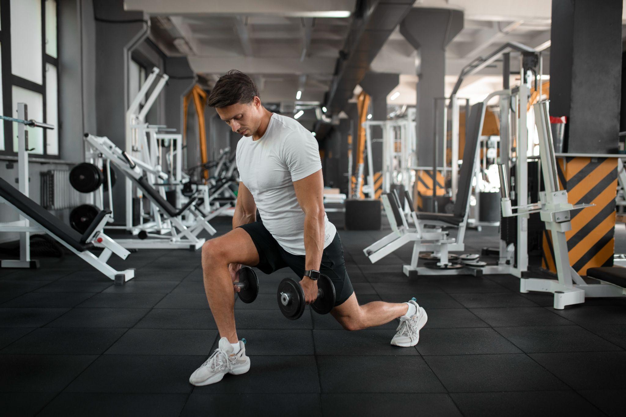 A man working out in the gym.