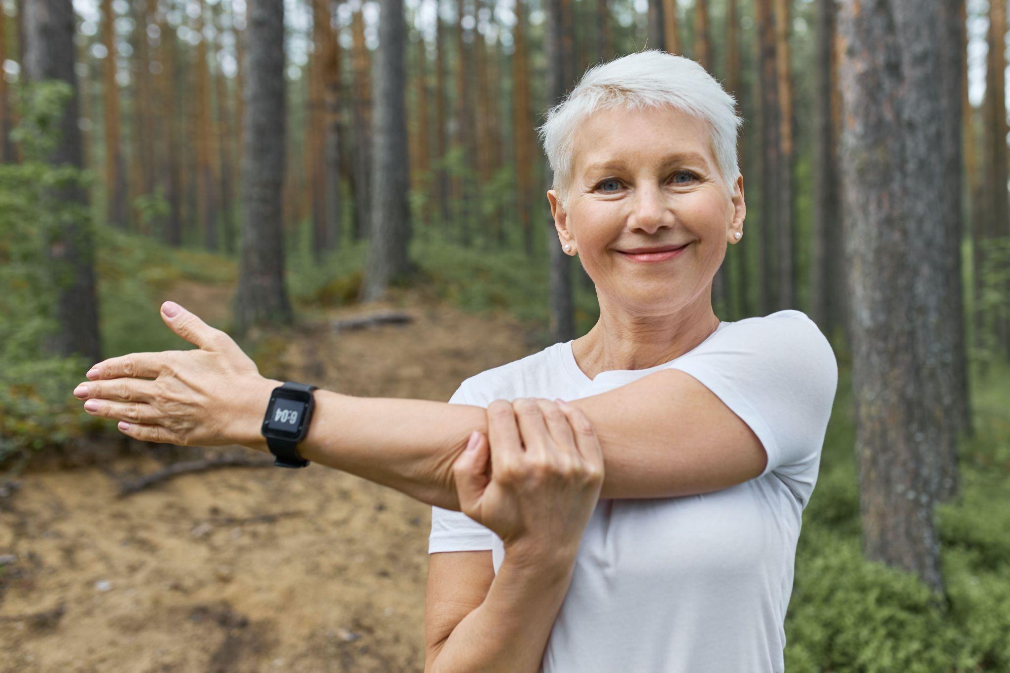 A happy woman working out.
