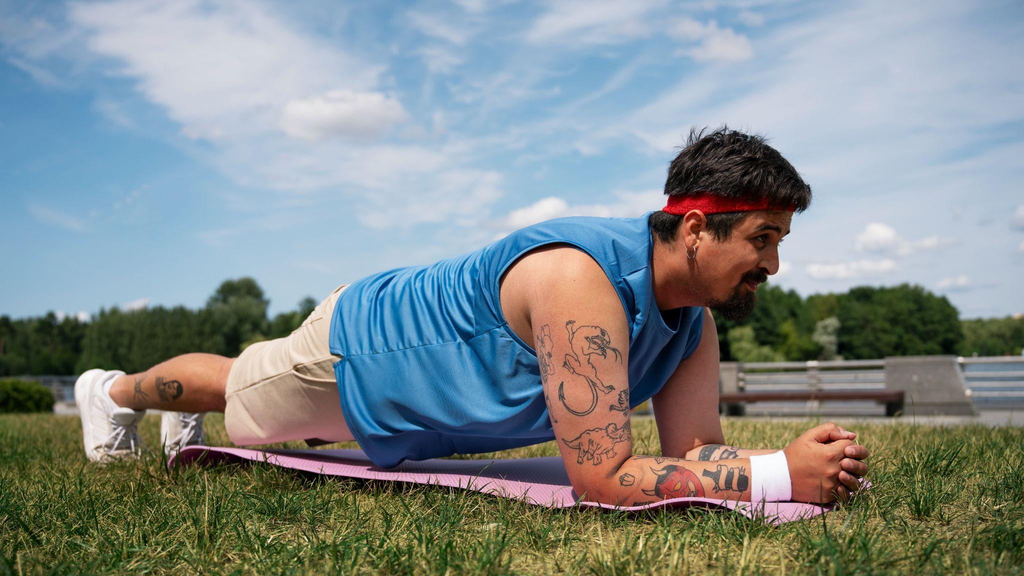 A person working out in the garden.