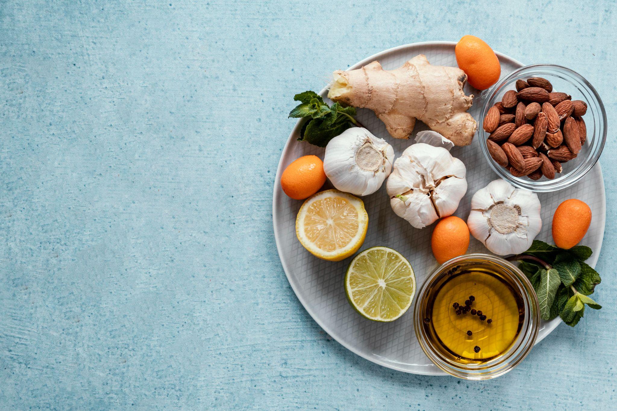 A selection of immunity-boosting foods including nuts, garlic, ginger, and citrus fruits. These nutrients help reduce inflammation and support bone repair after injury.