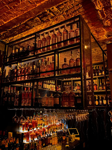 Whiskey cellar bar image featuring spirits shelf