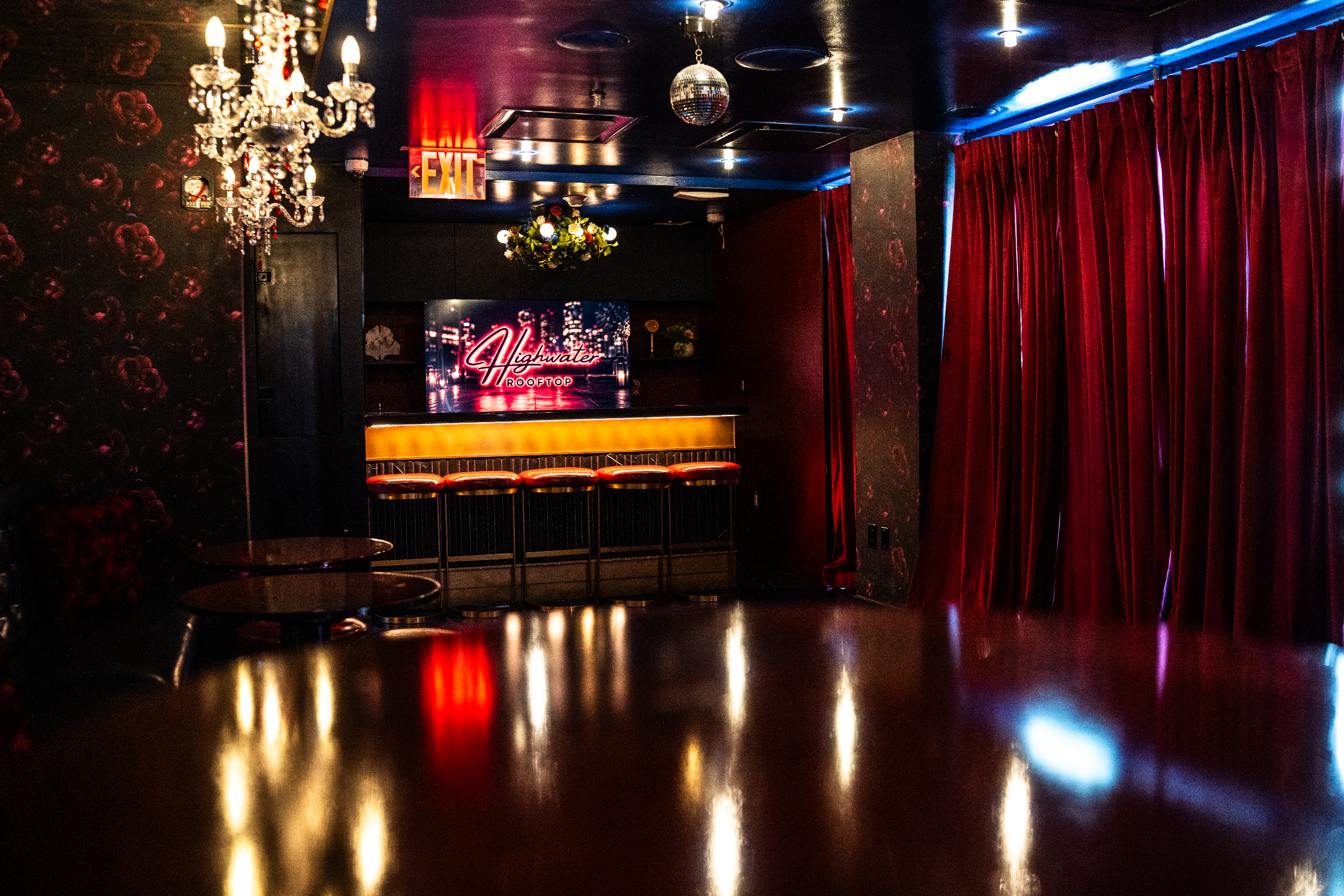 Wide event-floor view of the Midnight Victorian Parlor at Highwater Rooftop