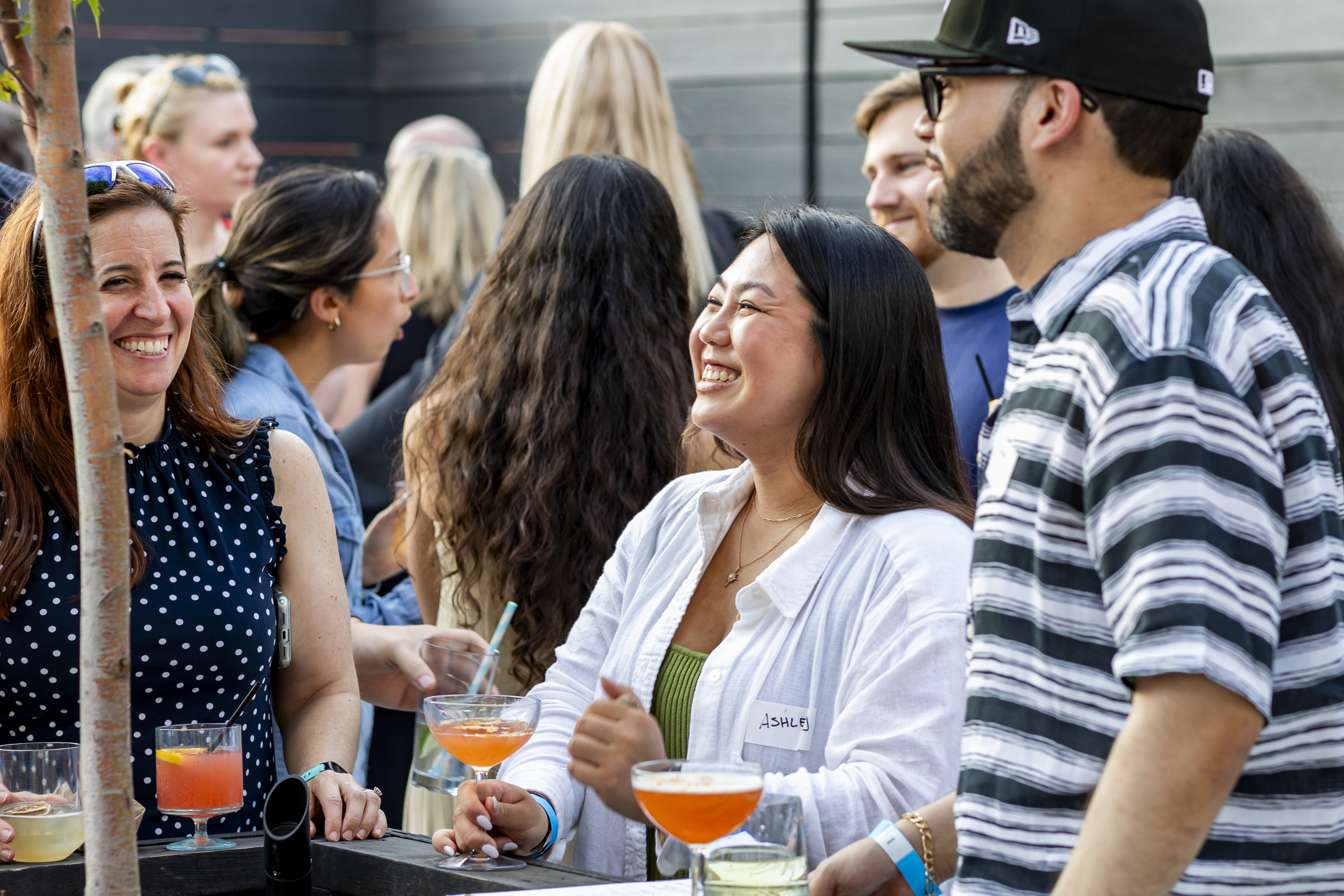 Guests socializing during a rooftop networking event at Lookup Rooftop in Midtown Manhattan.