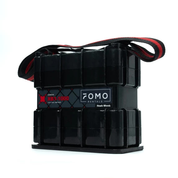 Hawk-Woods XB1-1000 block battery with FOMO Rentals branding