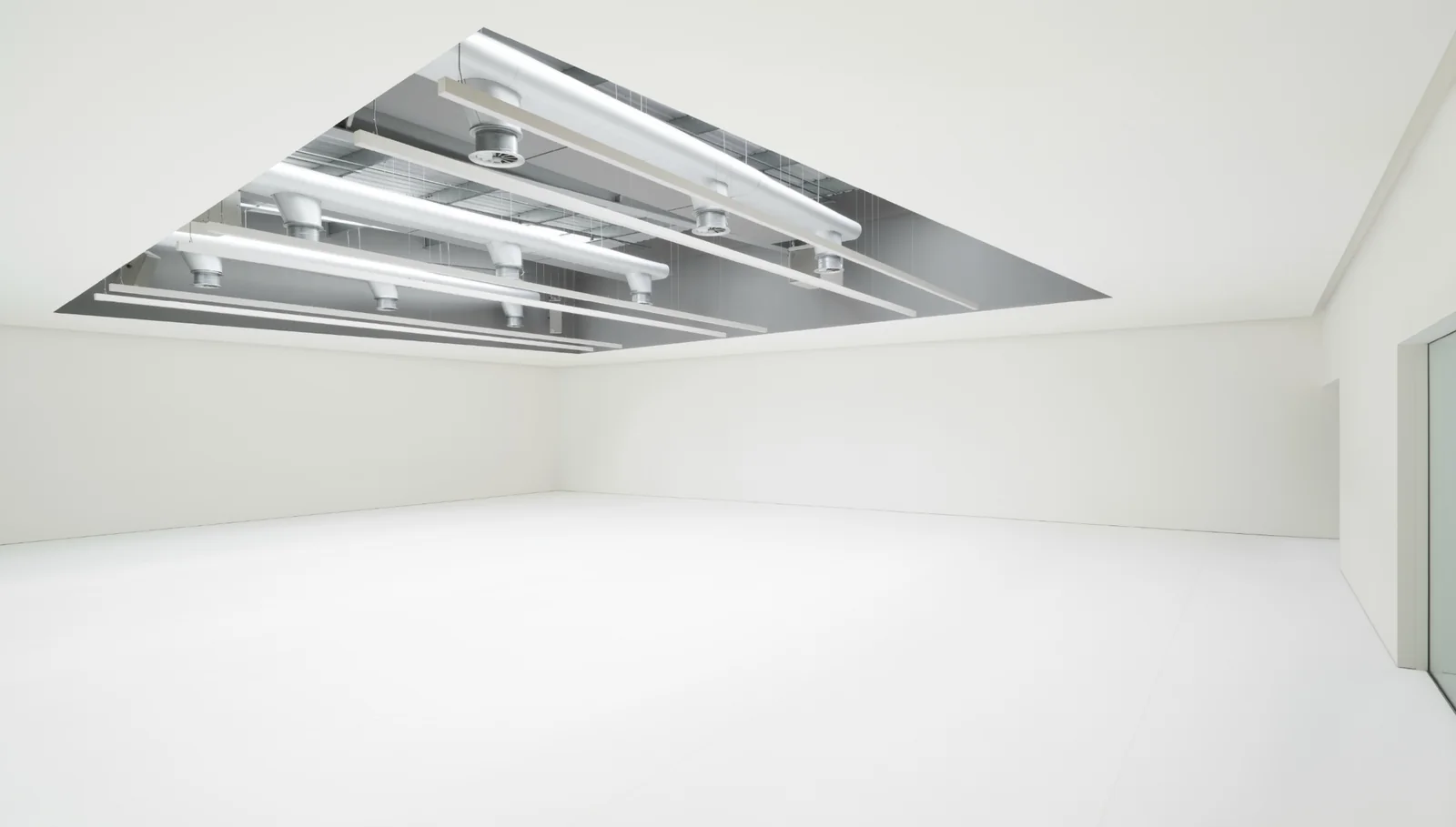 Studio 1 at Studio Wayne McGregor, a large white space lit through a feature ceiling aperture