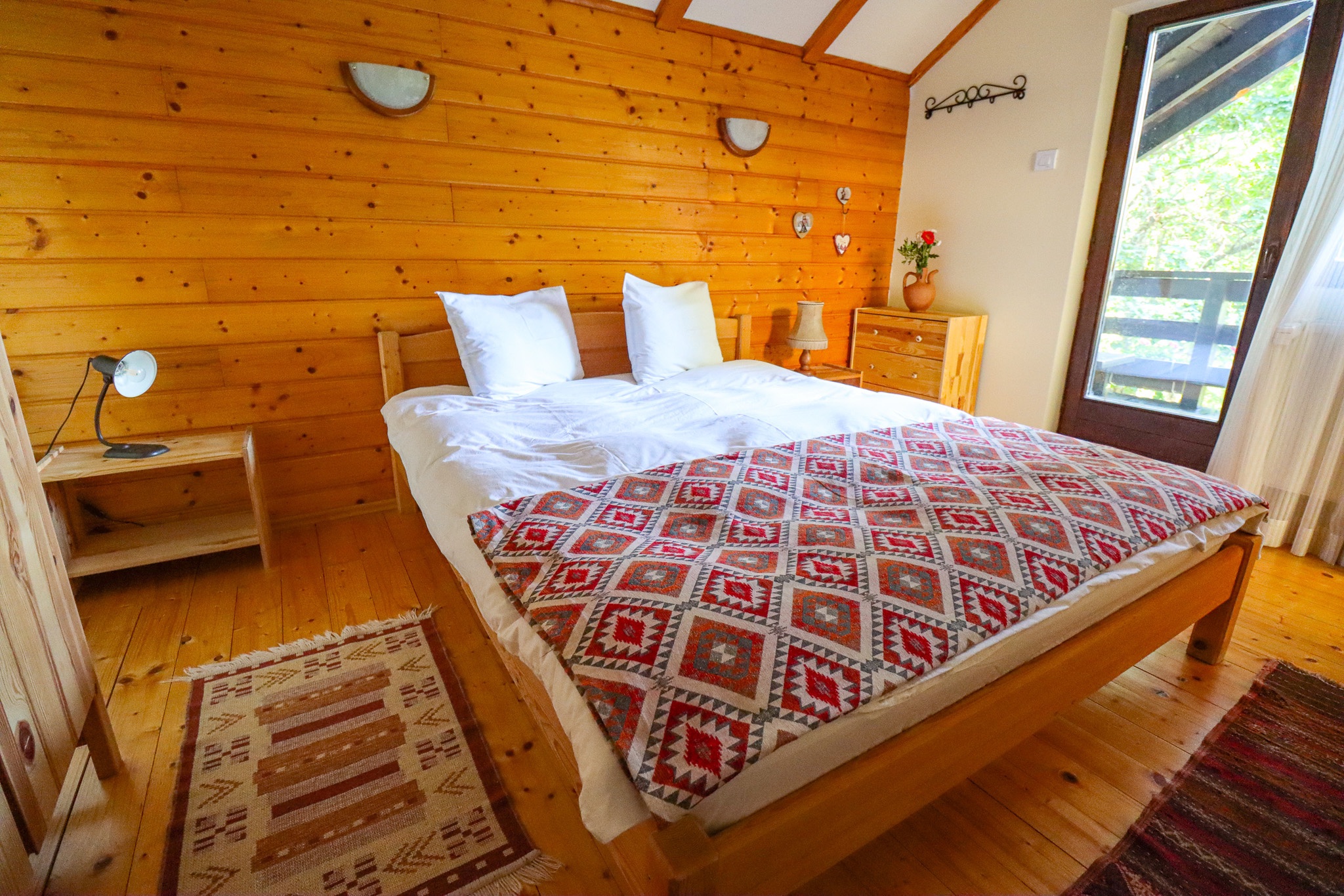 Interior staircase and hallway with warm wood paneling