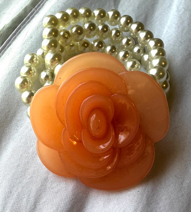 Decorative Amber-Colored Floral Object with Pearl-like Beads