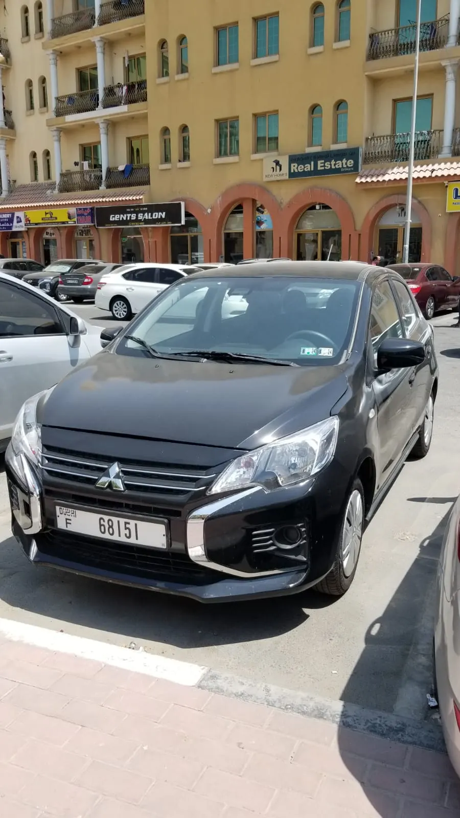 Rent Mitsubishi Mirage 2024 in Dubai | Affordable Compact Hatchback Car Rental