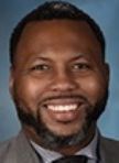 Kam  Buckner
