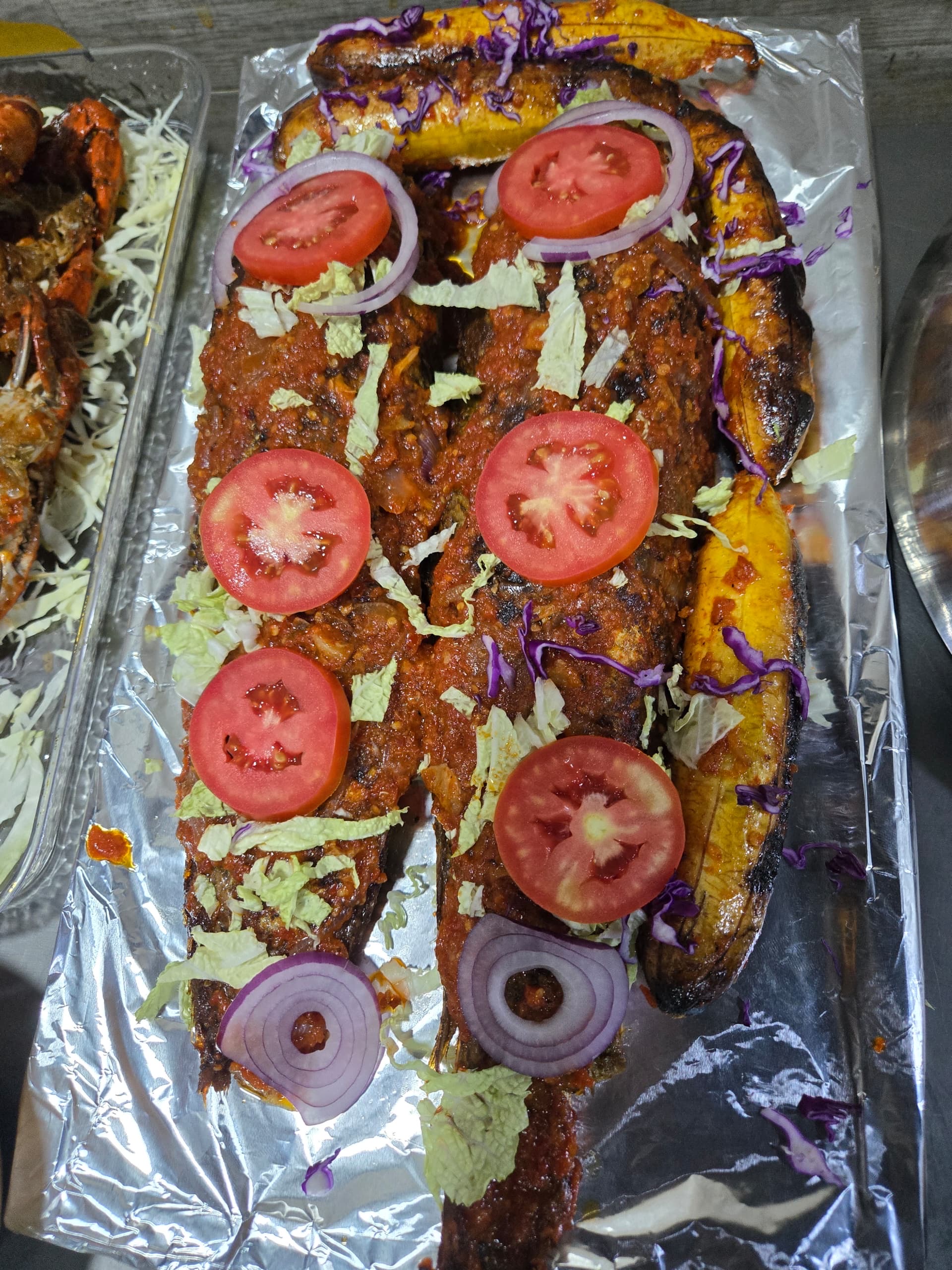 Barbecue fish with fried plantain