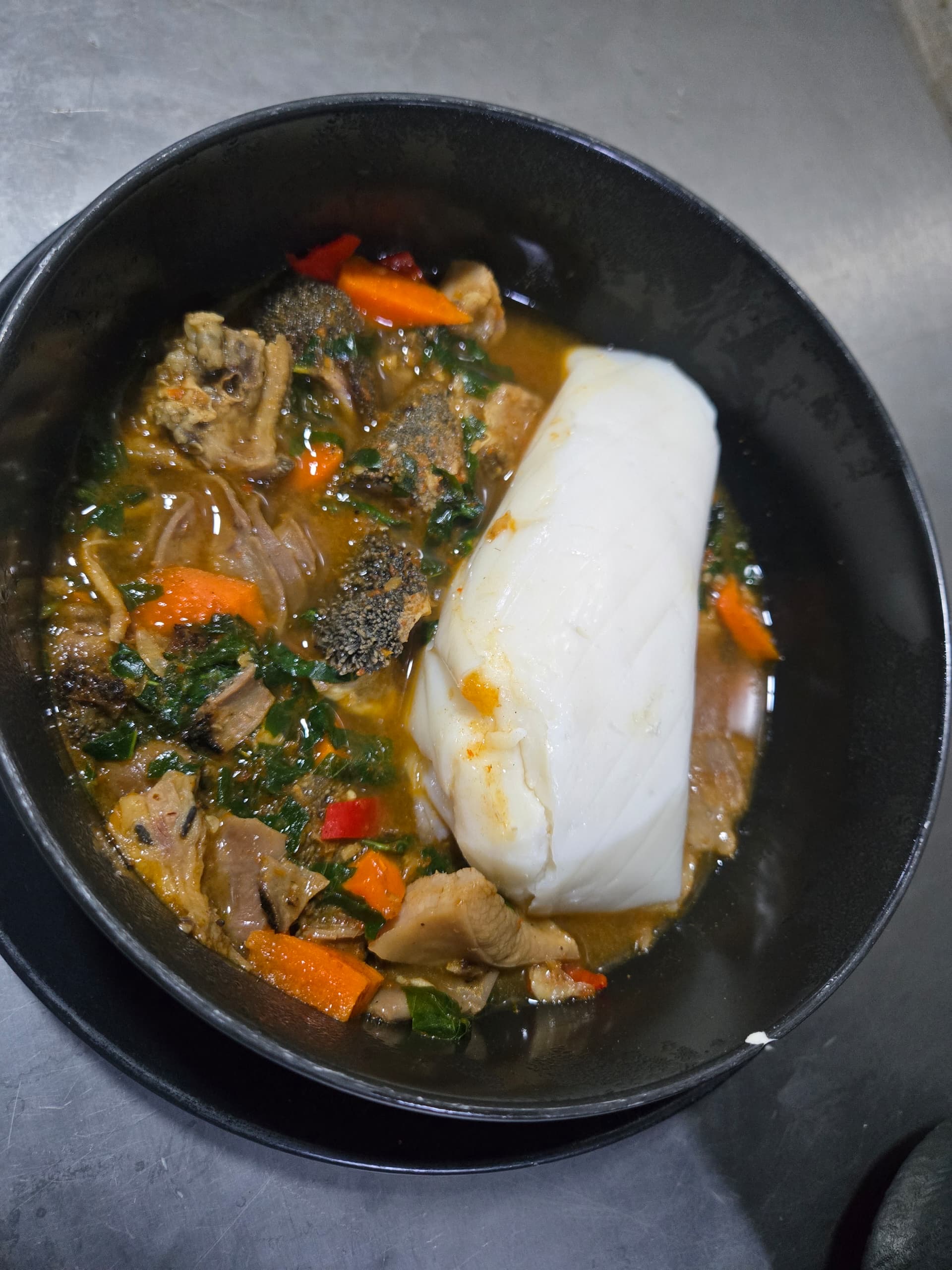 Offal pepper soup with agidi