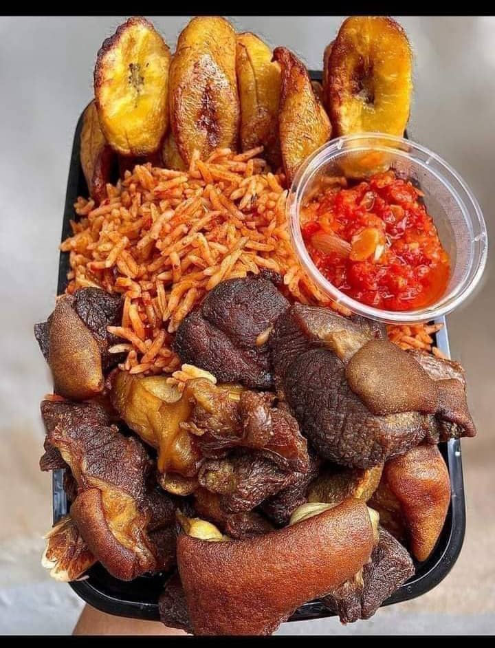 Party Jollof rice, fried meat and Plantain