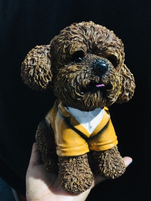 Alcancía perrito con tapita en su base