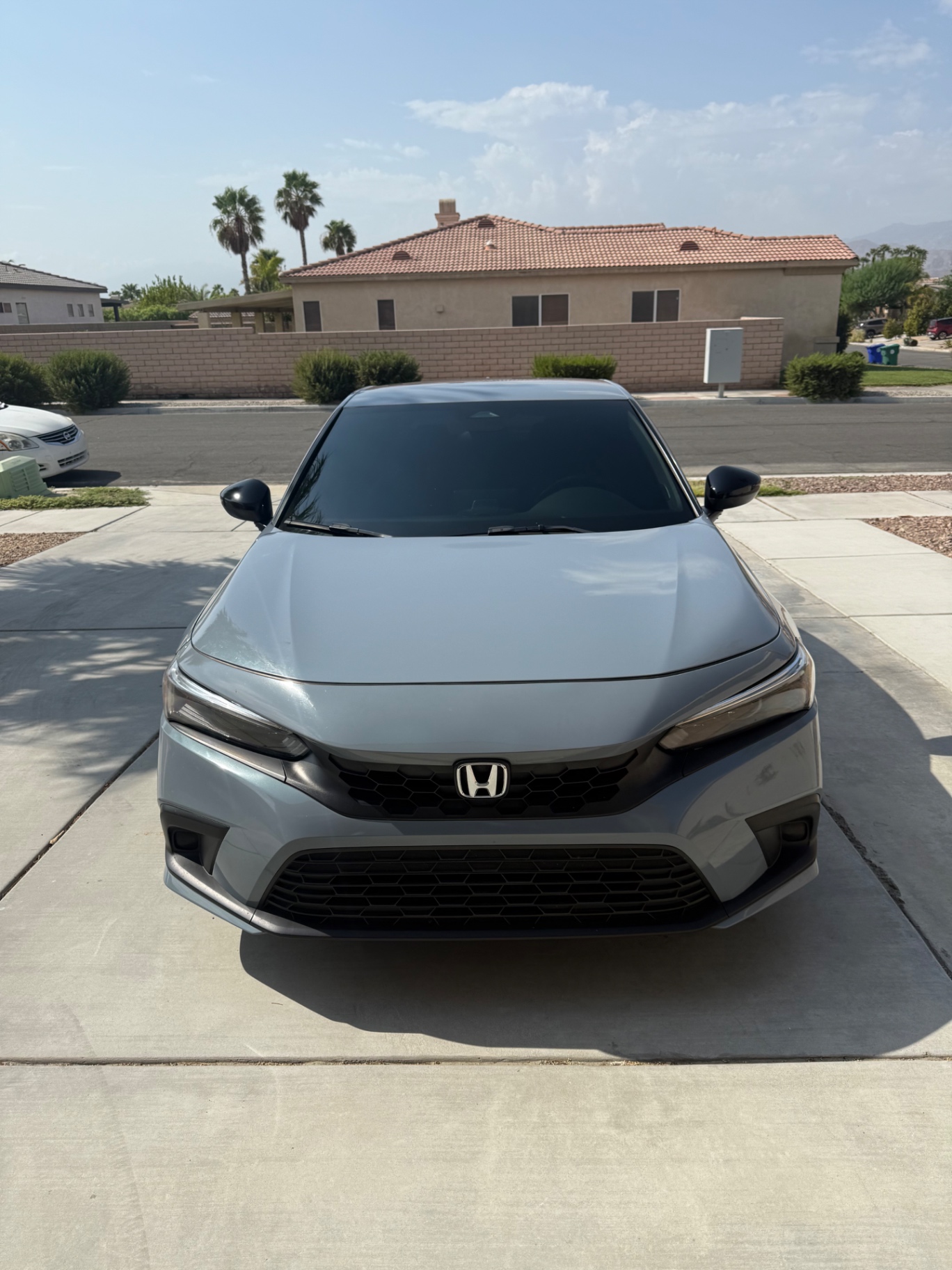2023 Honda Civic Sport Hatchback — rebuilt & branded title, 17% below market