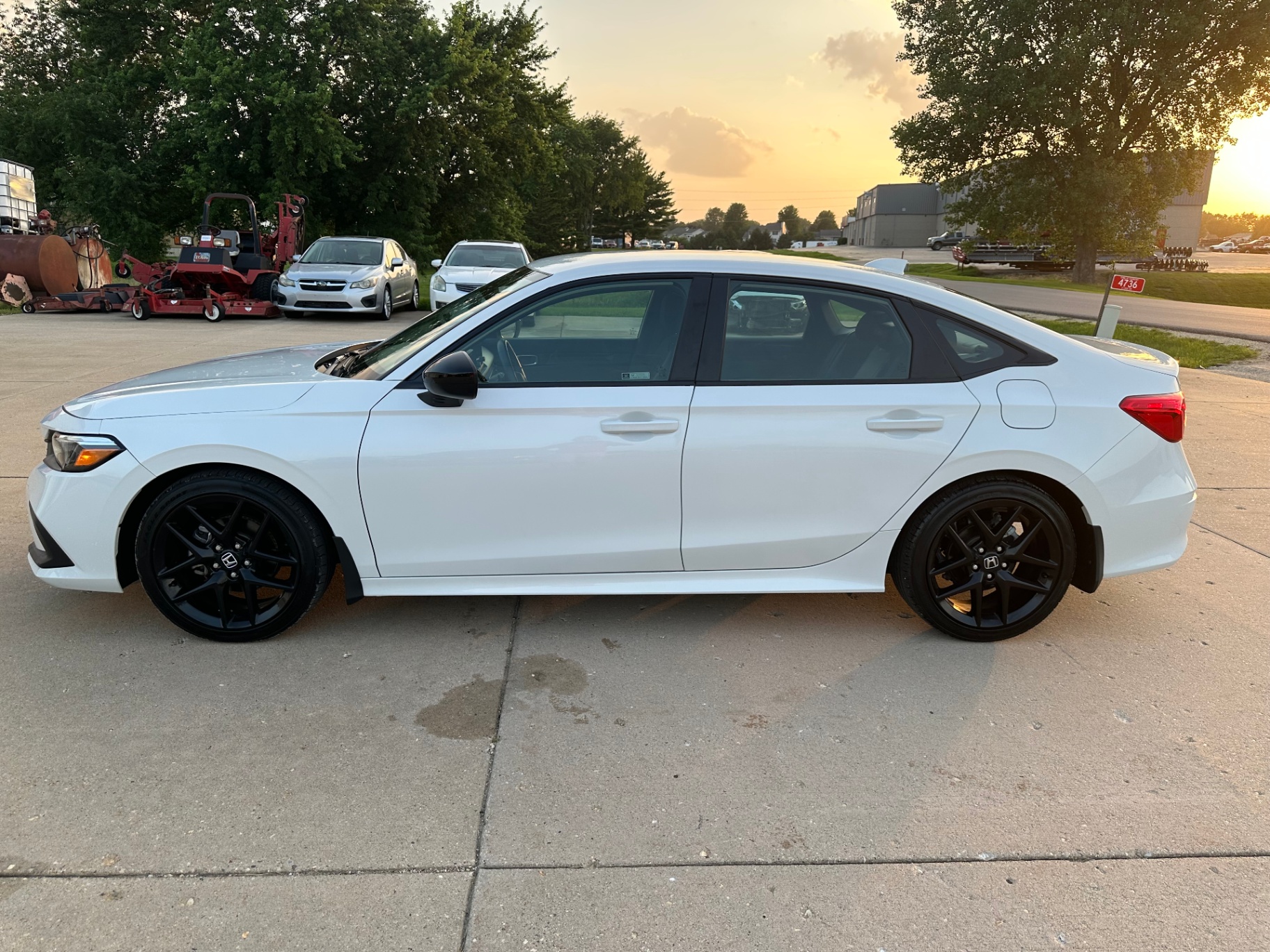 2022 Honda Civic Sport — rebuilt & branded title, 10% below market