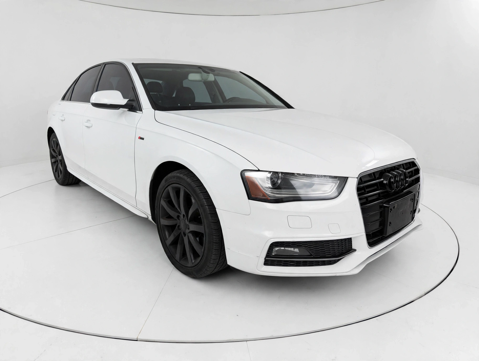 2014 Audi A4 Premium with S line package — rebuilt & branded title, 13% below market