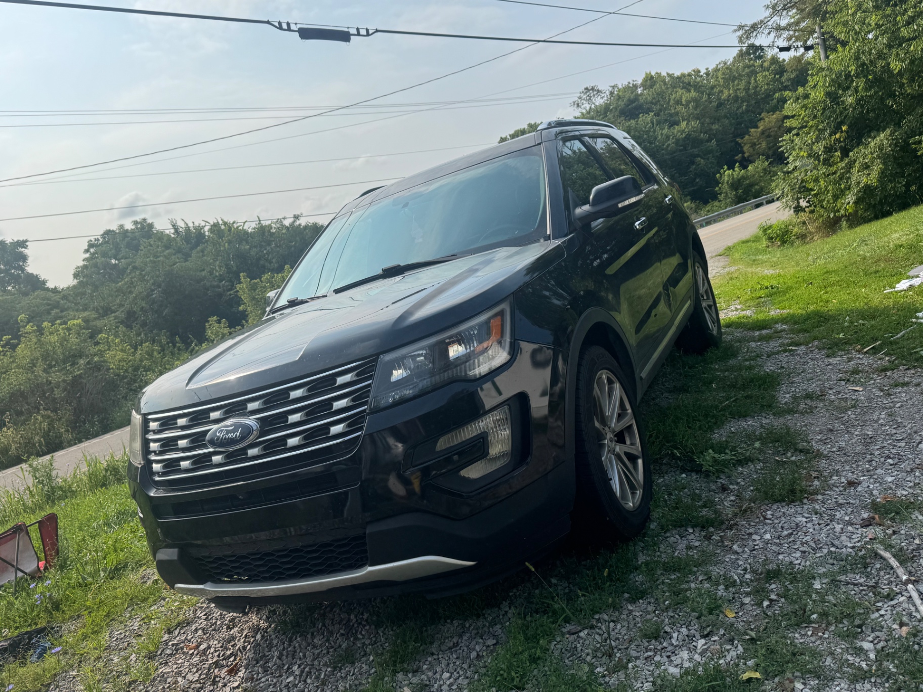 2017 Ford Explorer Limited — rebuilt & branded title, 27% below market