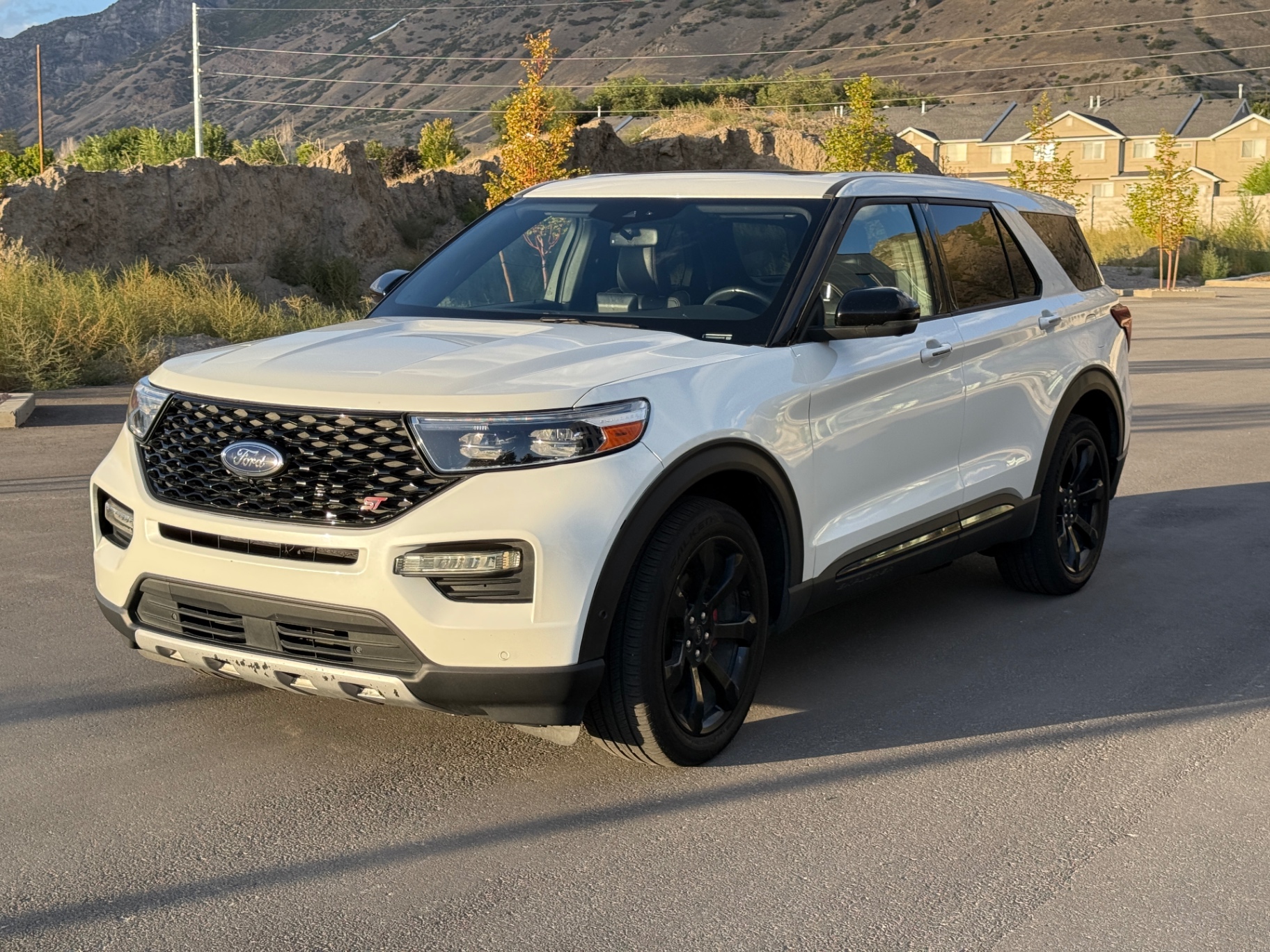 2021 Ford Explorer ST — rebuilt & branded title, 20% below market