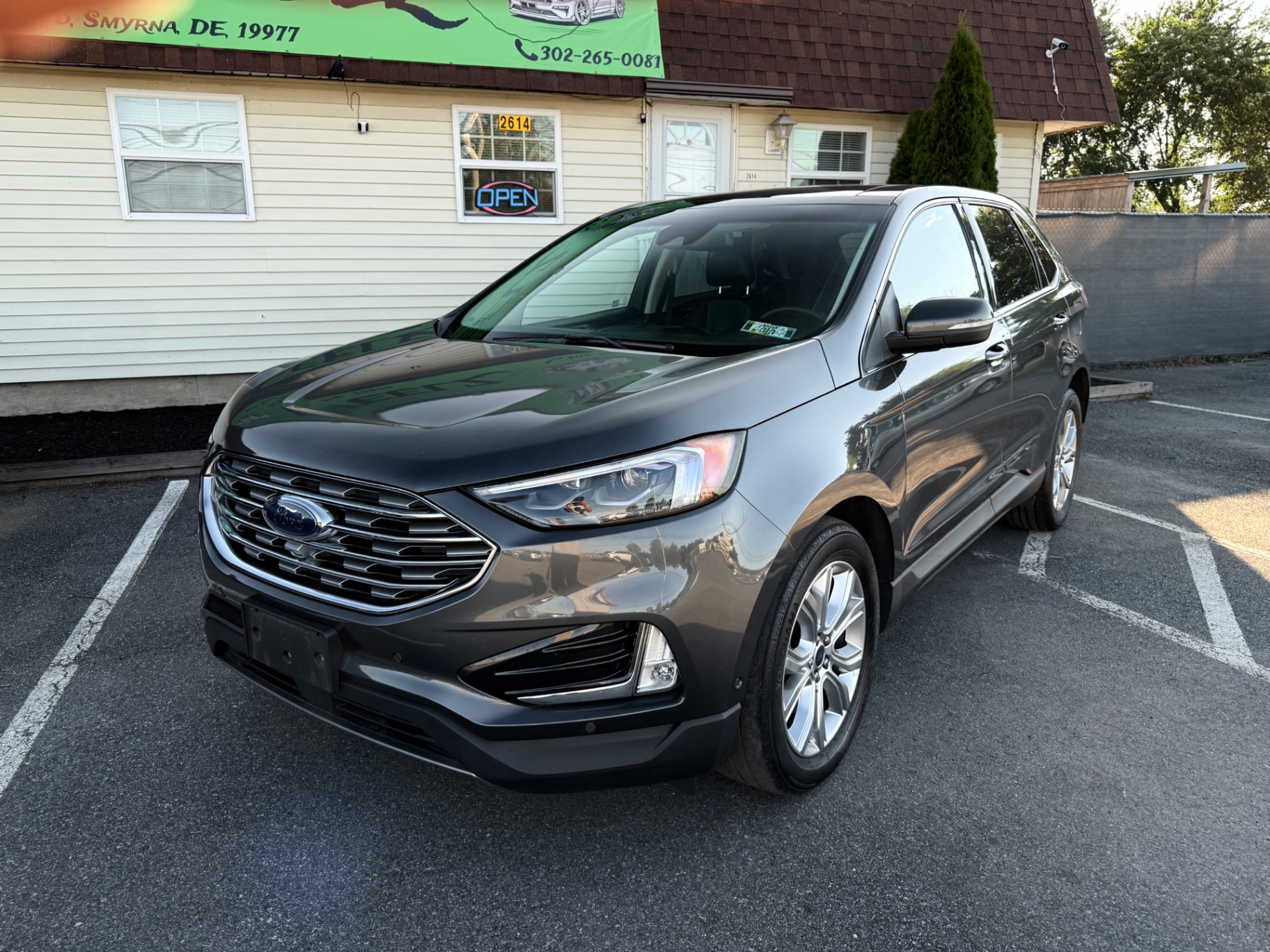 2020 Ford Edge Titanium — rebuilt & branded title, 25% below market