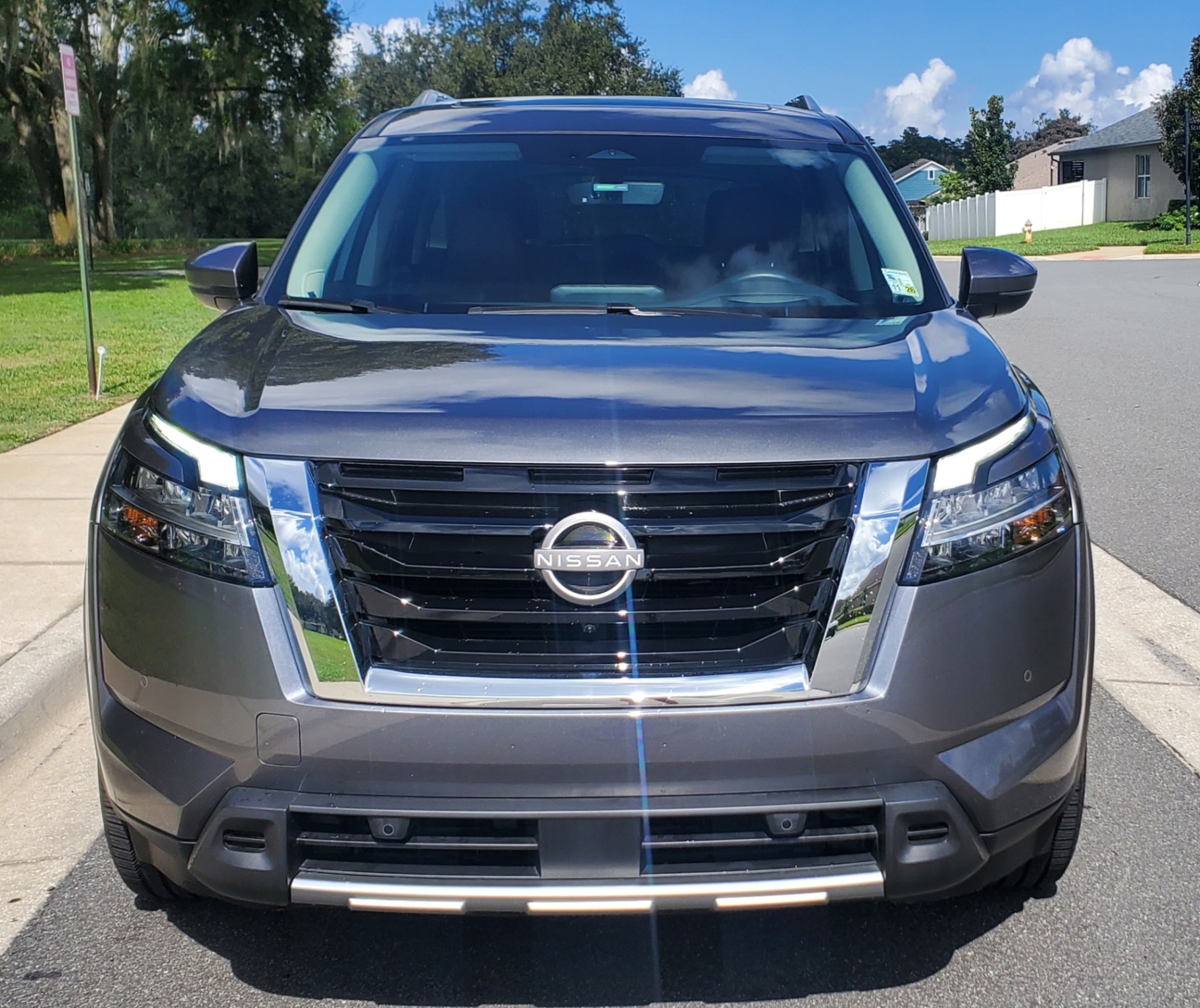 2024 Nissan Pathfinder PLATINUM — rebuilt & branded title, 17% below market