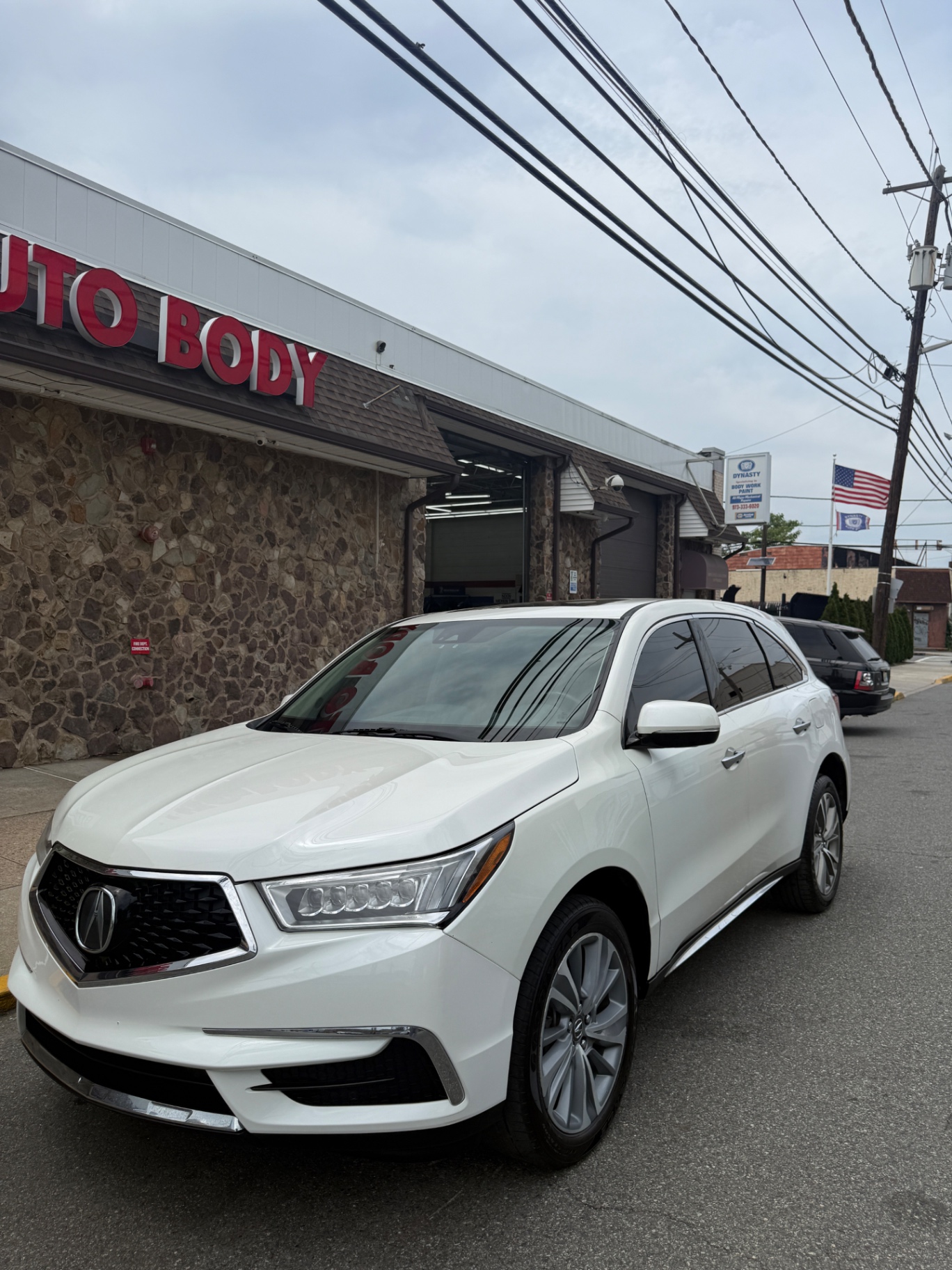 2017 Acura MDX SH-AWD (Tech Ent) — rebuilt & branded title, 5% below market