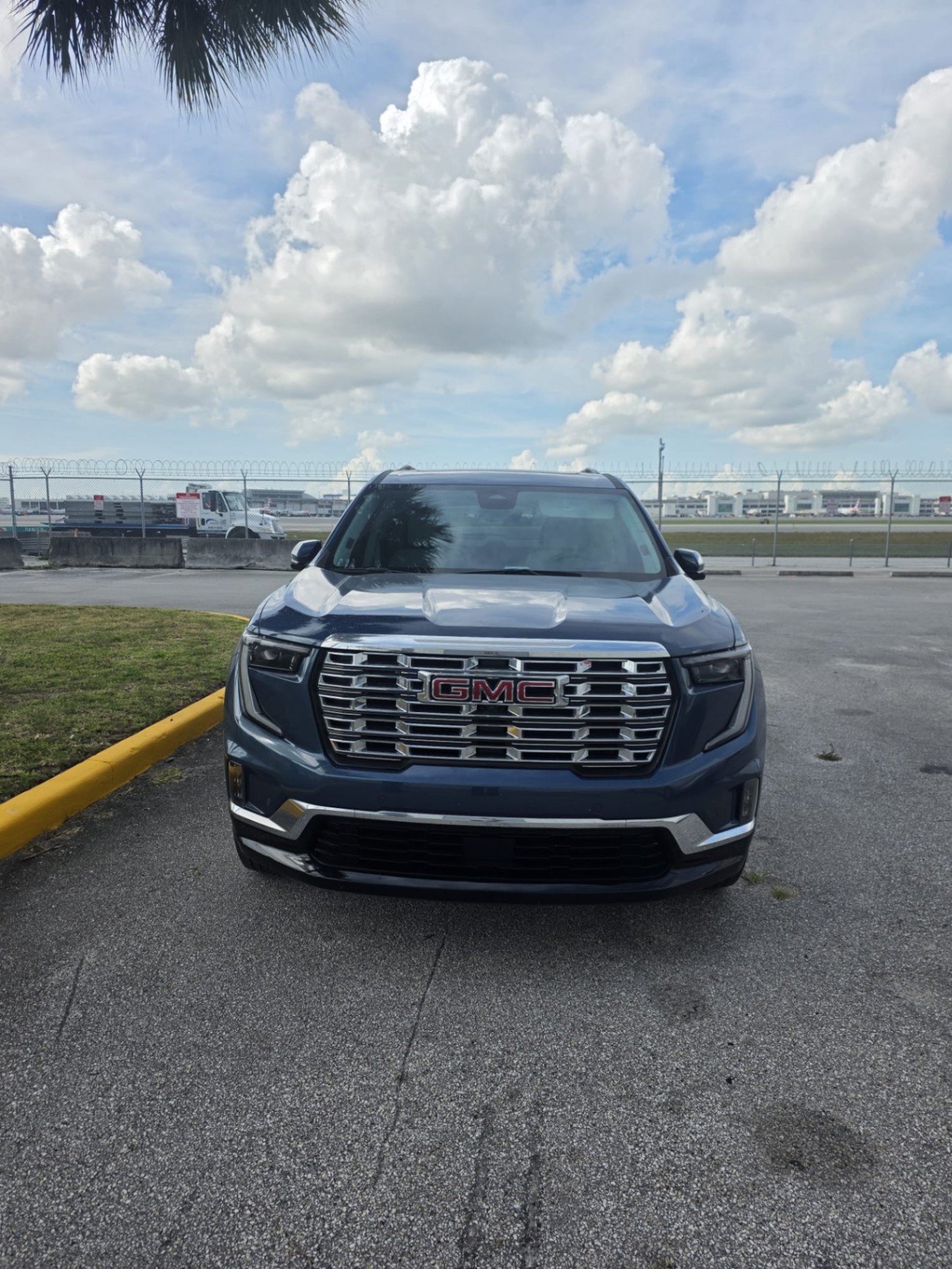 2024 GMC Acadia DENALI — rebuilt & branded title, 11% below market