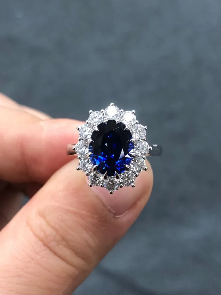 1692834400834-6c23d648-beb5-4254-9289-dc46fc2c2257.jpeg sapphire oval cut engagement ring