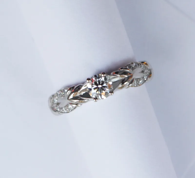 1692864684198-_MG_7109_copy copy.jpg round cut engagement ring