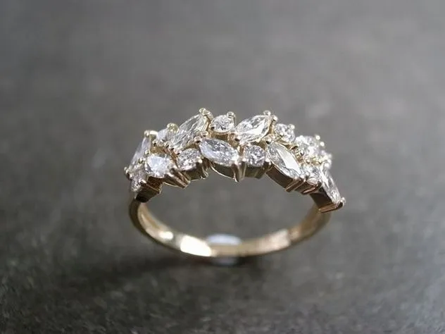 1692873260738-engagementring_collage.jpg pear cut engagement ring