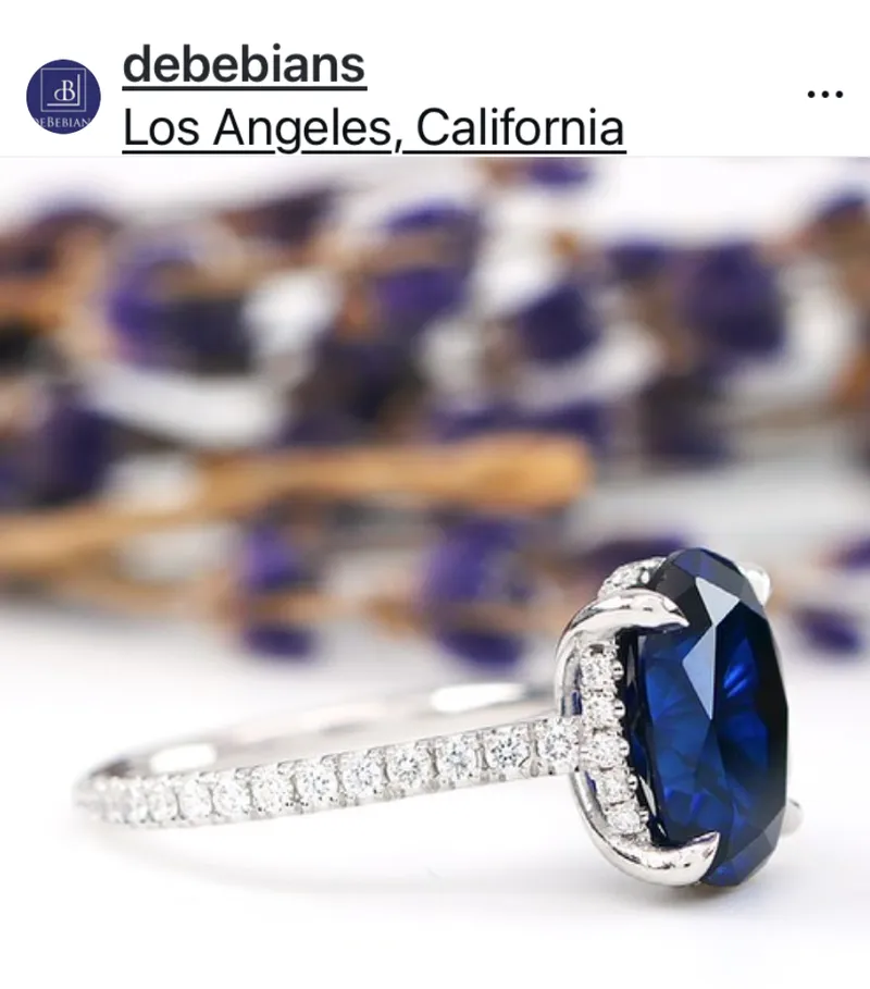 blue oval cut engagement ring