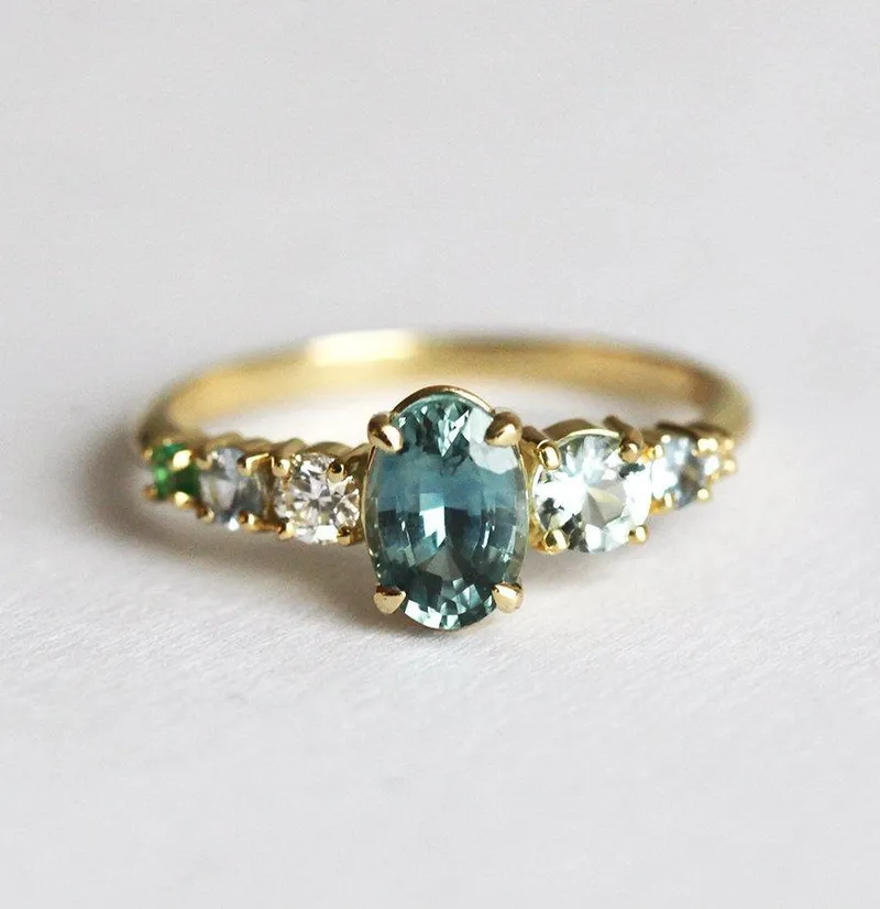 Azariah Blue Sapphire Cluster Ring blue sapphire oval cut engagement ring
