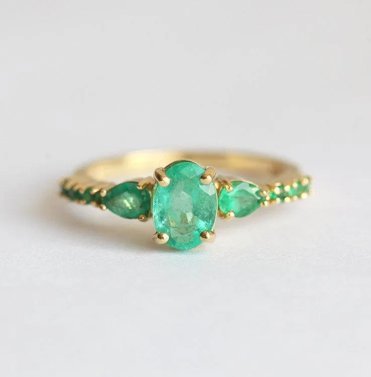 CAPRI GREEN EMERALD CLUSTER RING green emerald emerald cut engagement ring