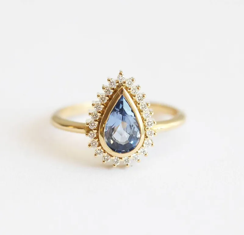 DAKSHA PEAR SAPPHIRE DIAMOND RING sapphire pear cut engagement ring