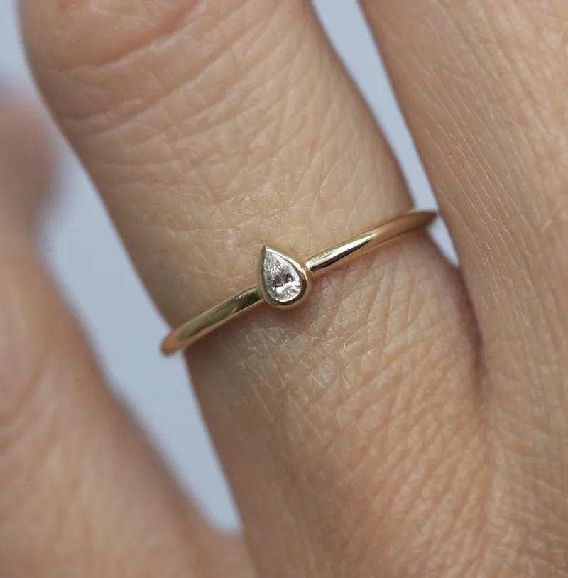 Delicate & Classy: Petite 0.1Ct Pear Solitaire Diamond Ring view 2