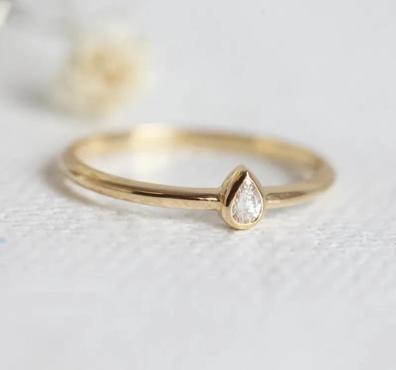 Delicate & Classy: Petite 0.1Ct Pear Solitaire Diamond Ring view 3