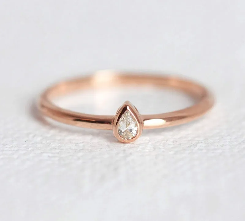 Delicate & Classy: Petite 0.1Ct Pear Solitaire Diamond Ring view 4